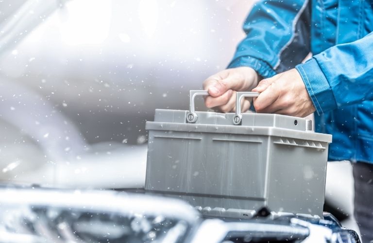 Replacing battery in a vehicle during winter